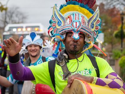 Costumed participants celebrate in the Junkanoo and parade down Main Street
