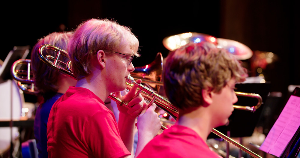 Trombonists perform in Atlantic Theatre Festival.