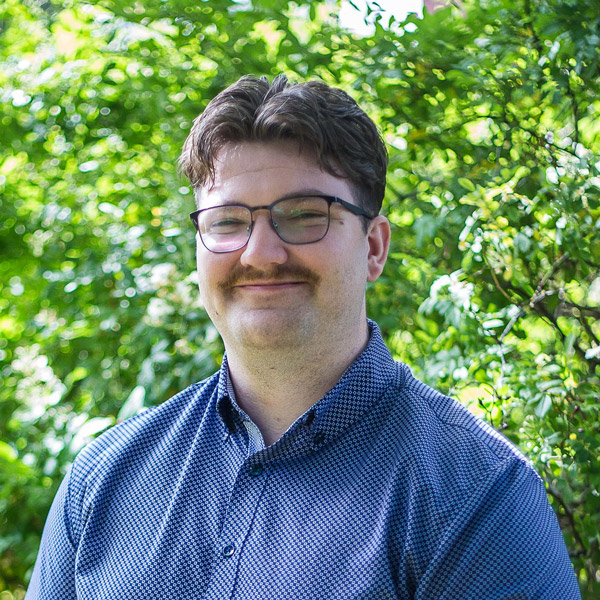 Headshot portrait of Matthew Carroll
