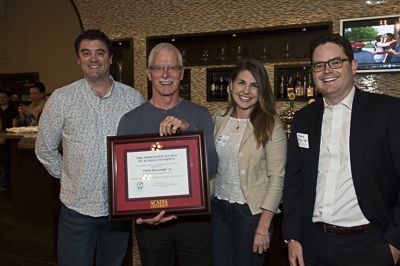 tl_files/sites/advancement/resources/TO lobster pic3, CKavanagh with award.jpg